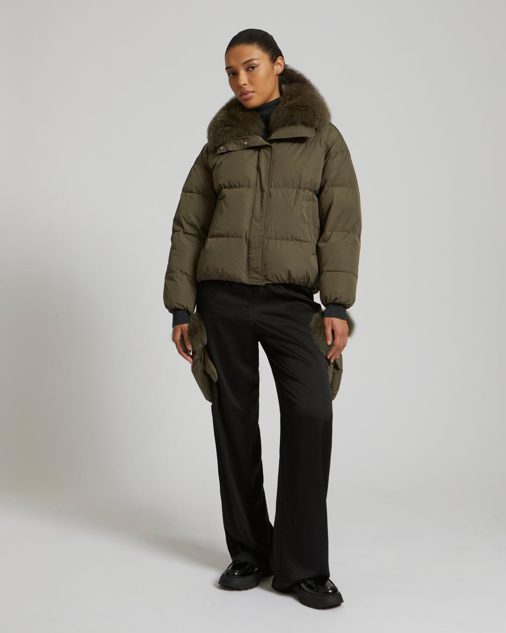 Boxy down jacket in waterproof technical fabric with fox fur collar