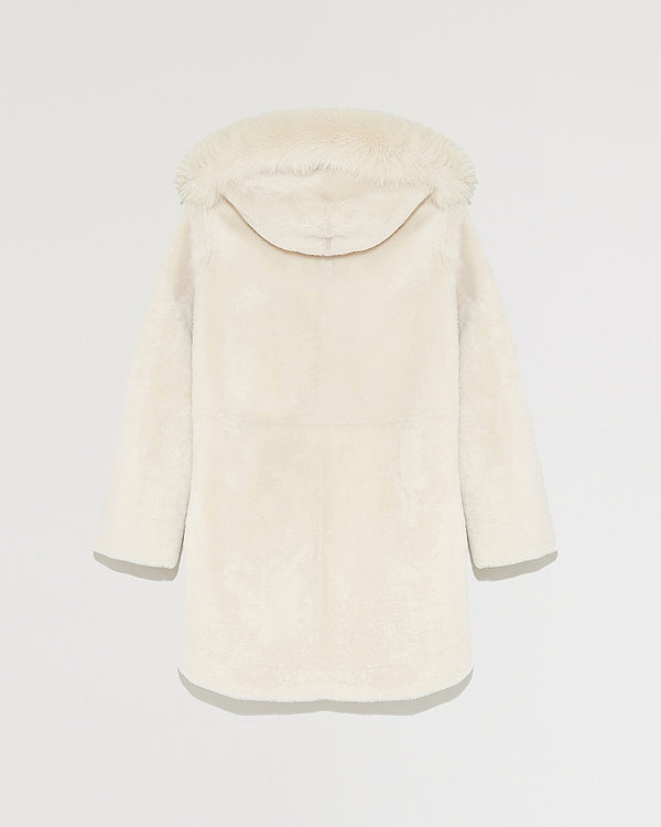 Reversible coat in shearling and fox fur