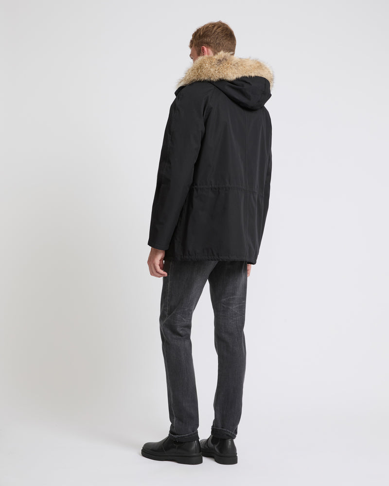 Short iconic parka in technical cotton and fur - black - Yves Salomon