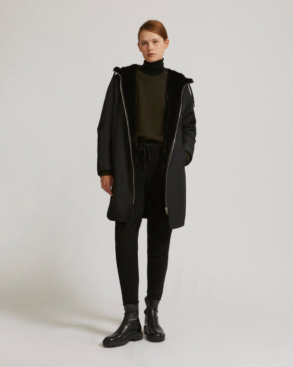Long reversible coat in mink fur and technical fabric