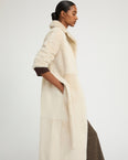 Long reversible belted shearling coat