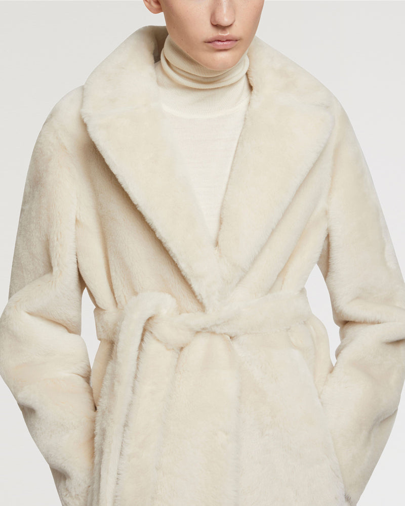 Long reversible belted shearling coat