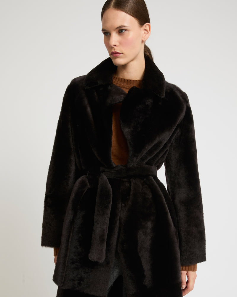 Long reversible belted shearling coat