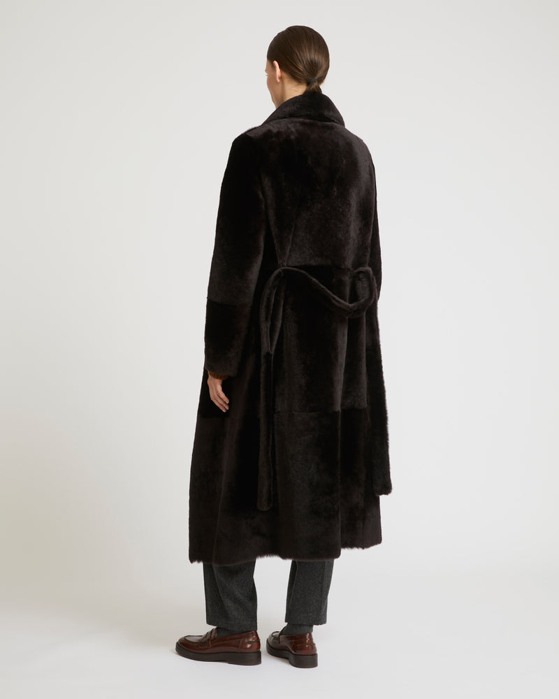 Long reversible belted shearling coat