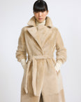 Reversible belted long shearling coat