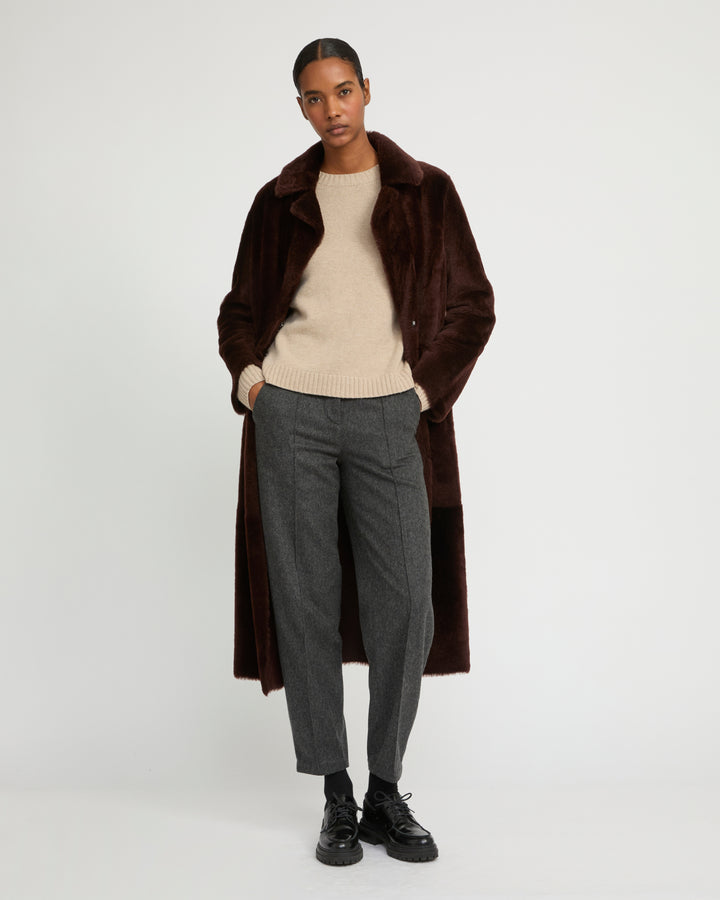 Long reversible belted shearling coat
