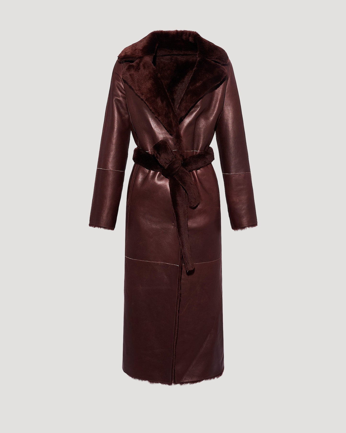 Long reversible belted shearling coat