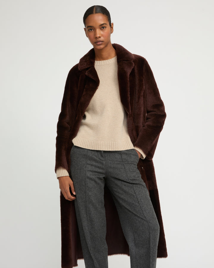 Long reversible belted shearling coat