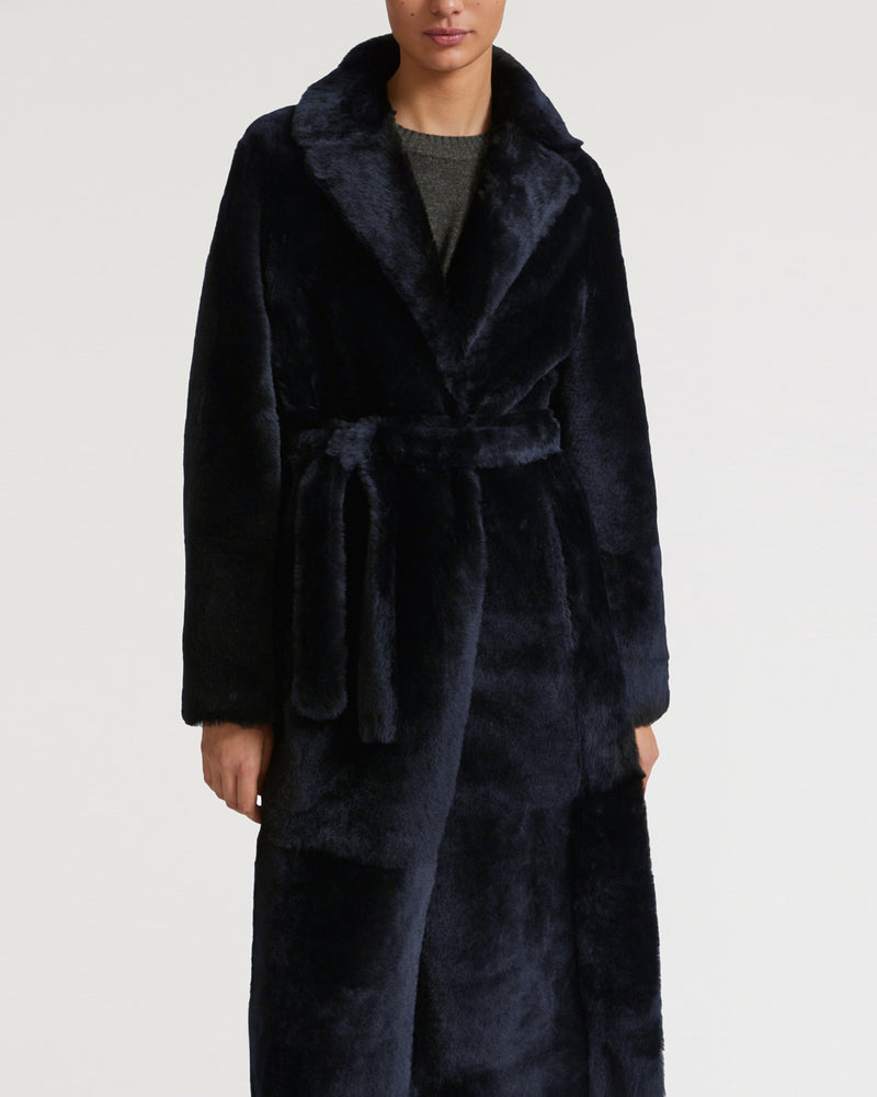 Long reversible belted shearling coat