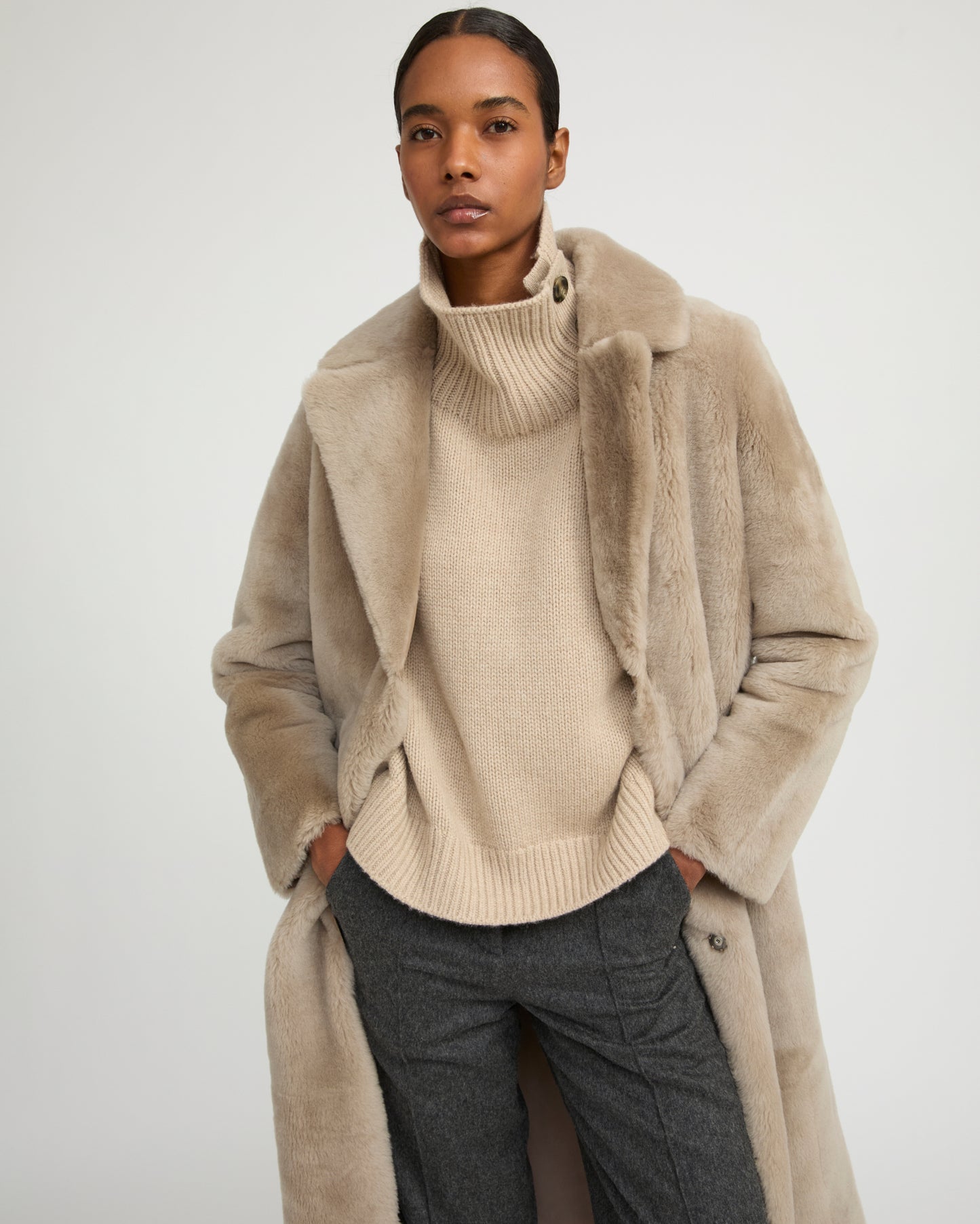 Long reversible belted shearling coat