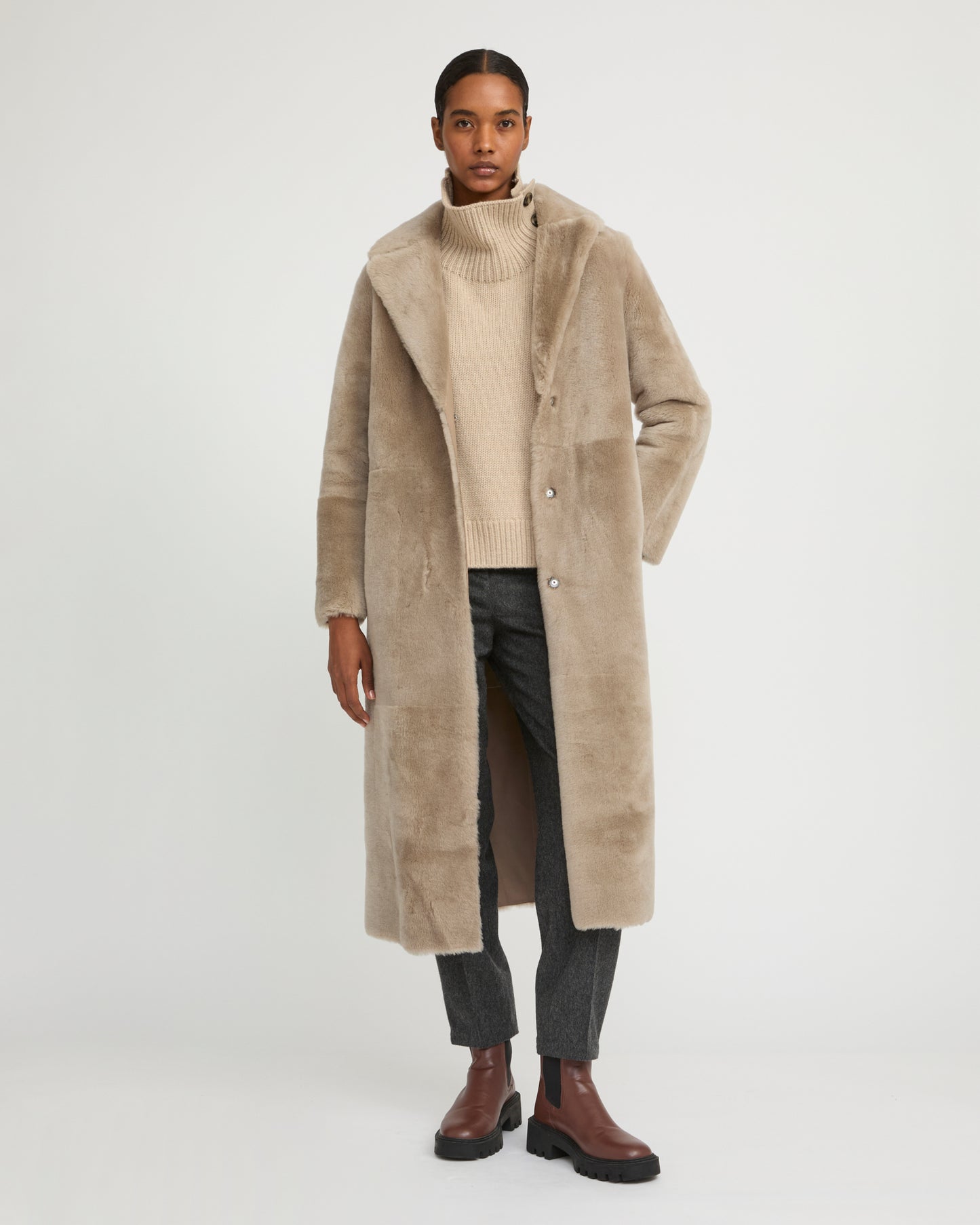 Long reversible belted shearling coat