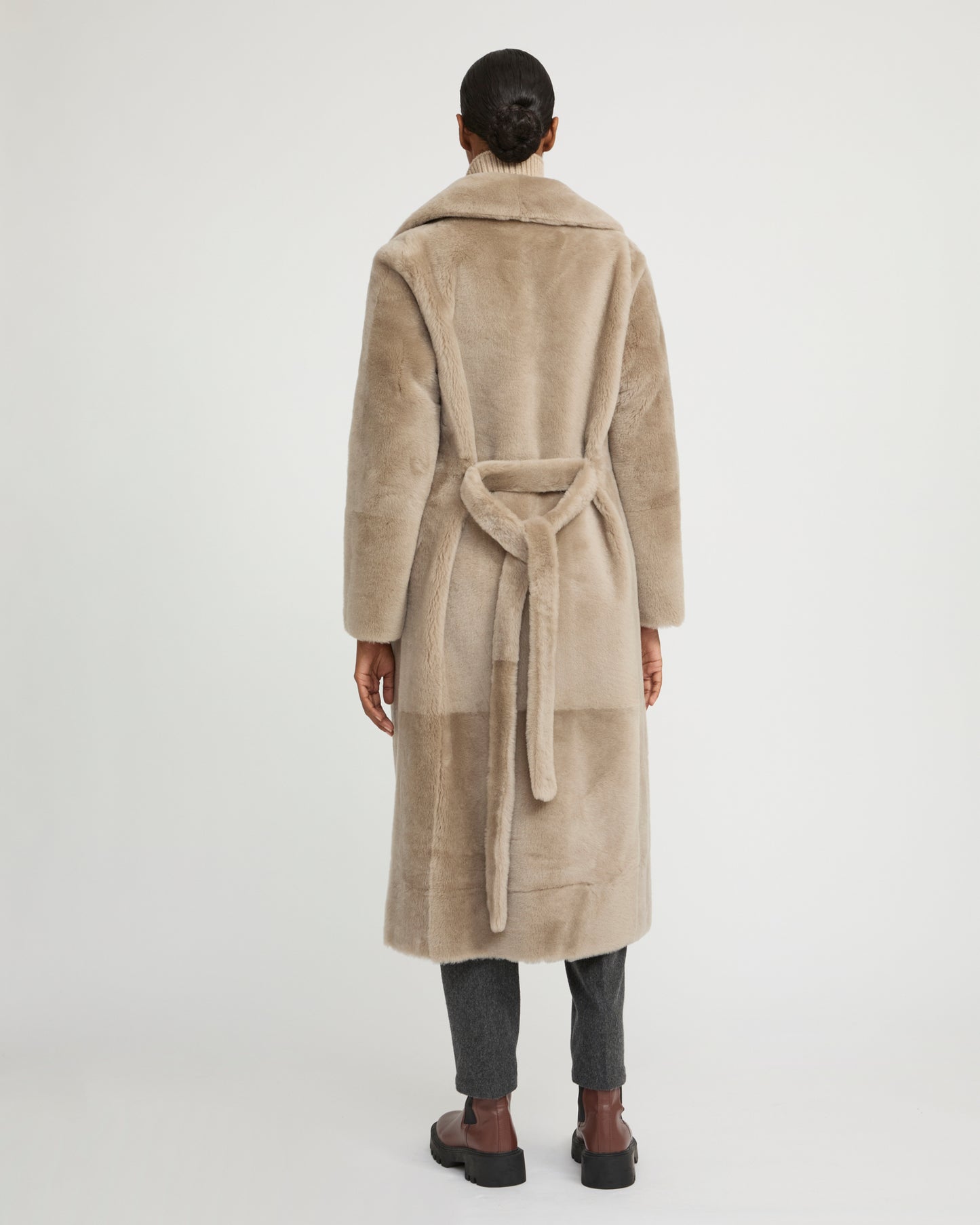 Long reversible belted shearling coat