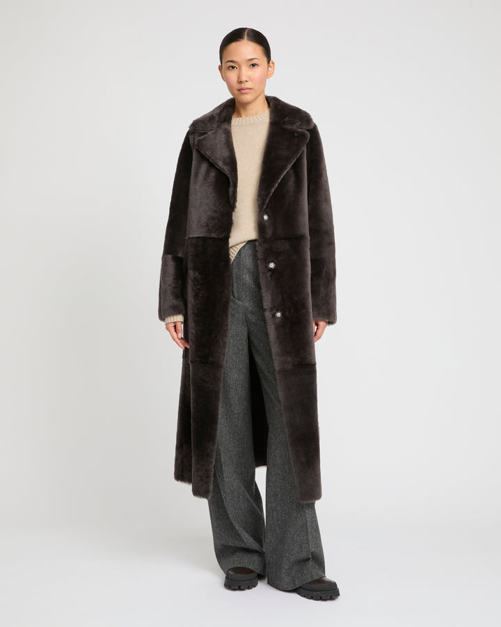 Long reversible belted shearling coat