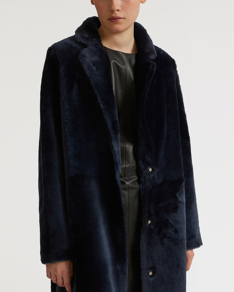 Reversible merino lambskin coat with tailored collar