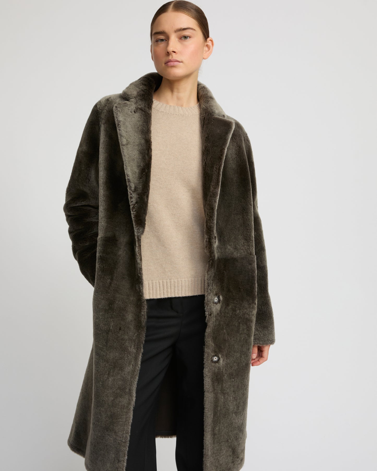 Reversible merino shearling coat