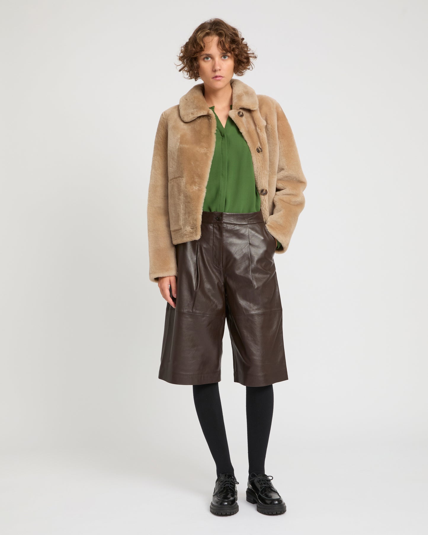 Short reversible jacket in merino lambskin