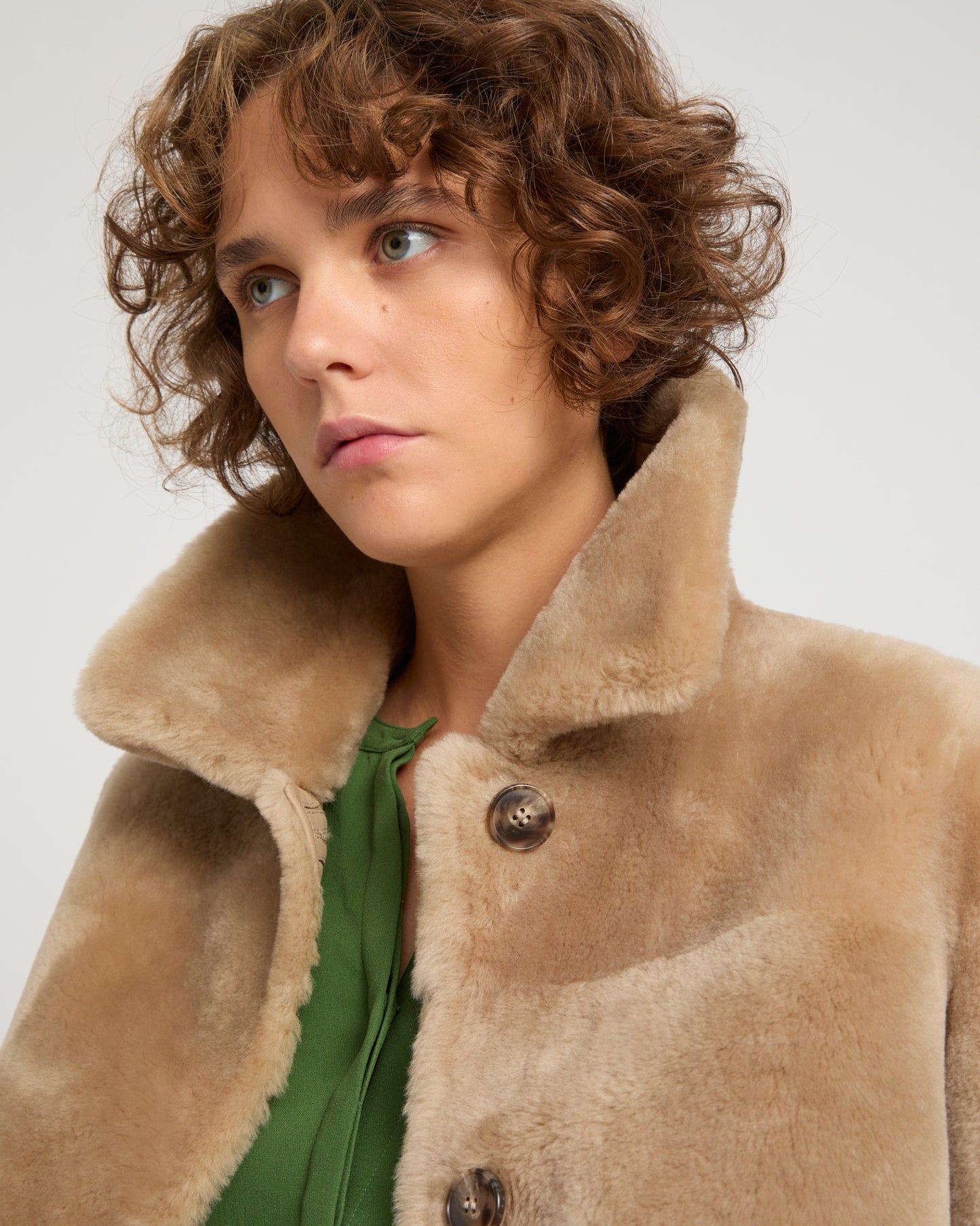 Short reversible jacket in merino lambskin