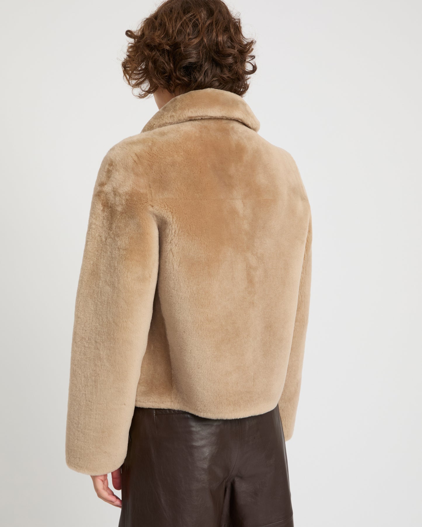 Short reversible jacket in merino lambskin