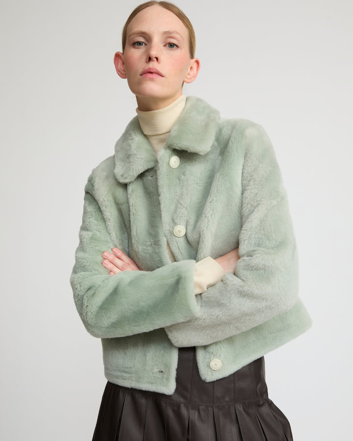 Short reversible jacket in merino lambskin