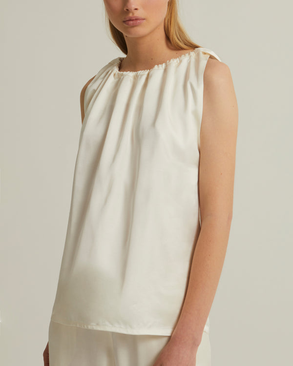 Sleeveless top with adjustable satin neckline - white