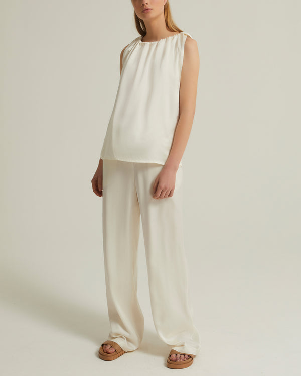 Sleeveless top with adjustable satin neckline - white