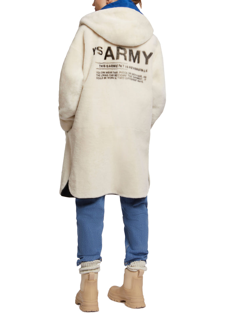 Reversible parka in water-repellent technical fabric and shearling