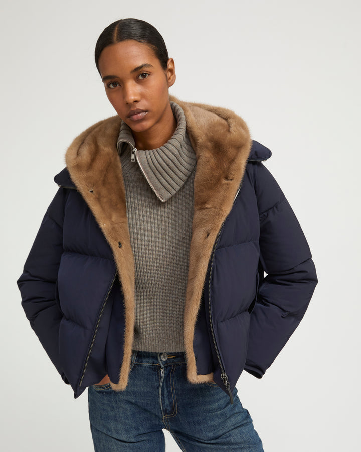 Iconic "A" line down jacke with mink fur hooded bib
