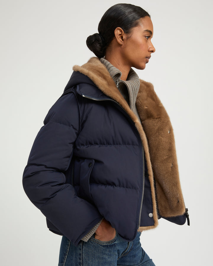 Iconic "A" line down jacke with mink fur hooded bib