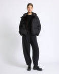 Iconic "A" line down jacket with mink fur hooded bib
