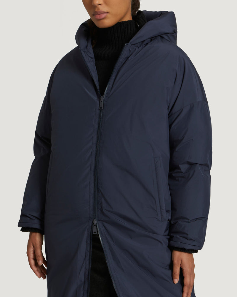 Long reversible hooded down jacket in waterproof technical fabric