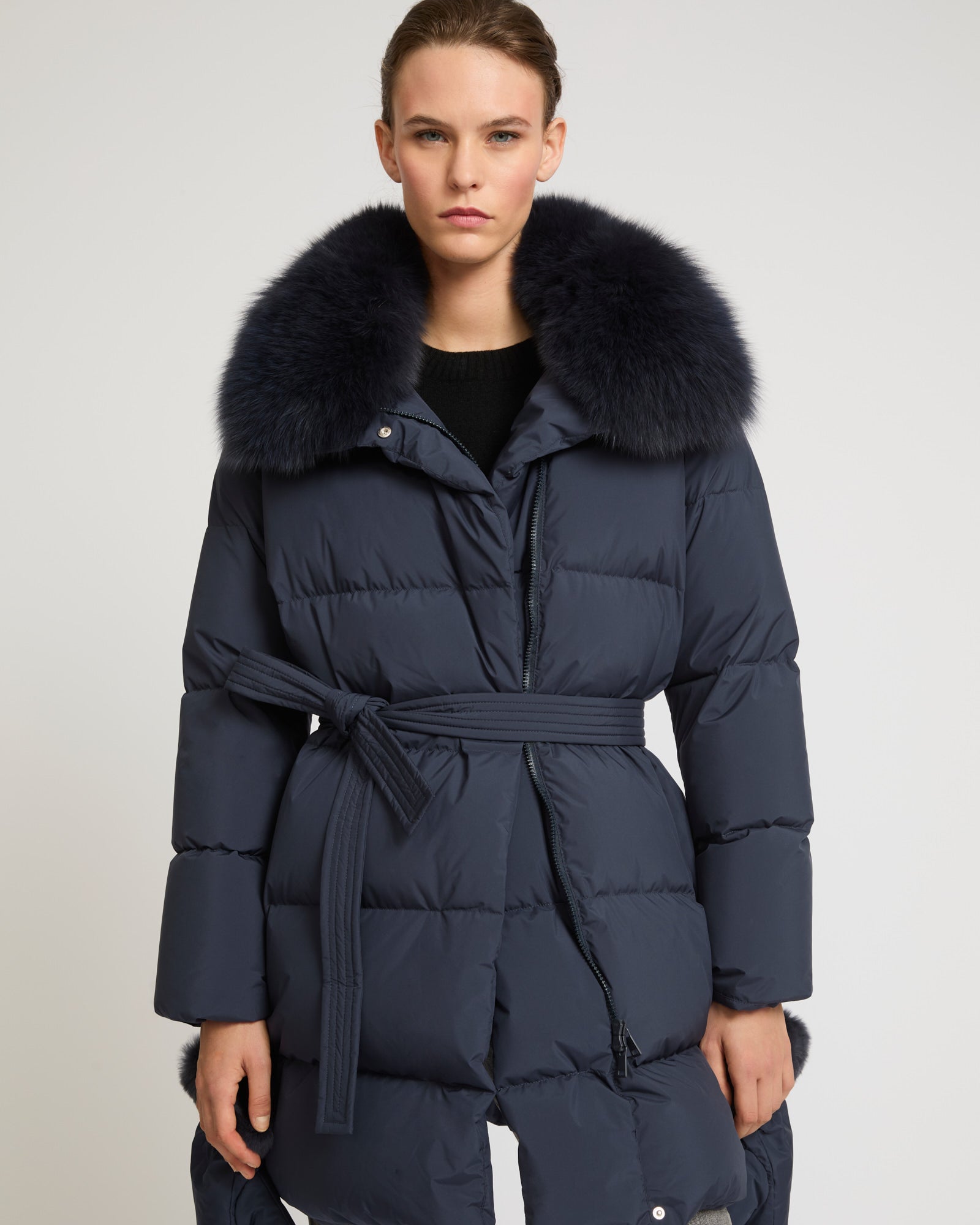 Belted down jacket in waterproof technical fabric with fox