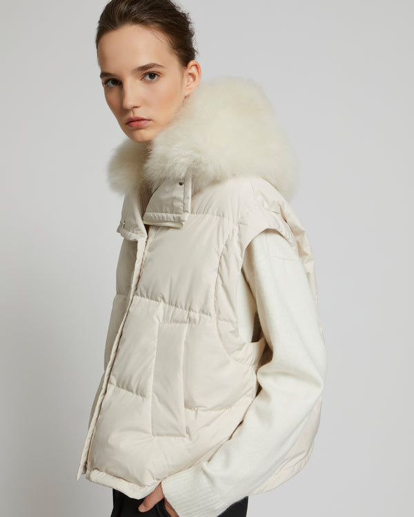 Oversized down jacket in waterproof technical fabric with long-haired lambskin collar