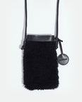 Phone case in curly merino and leather