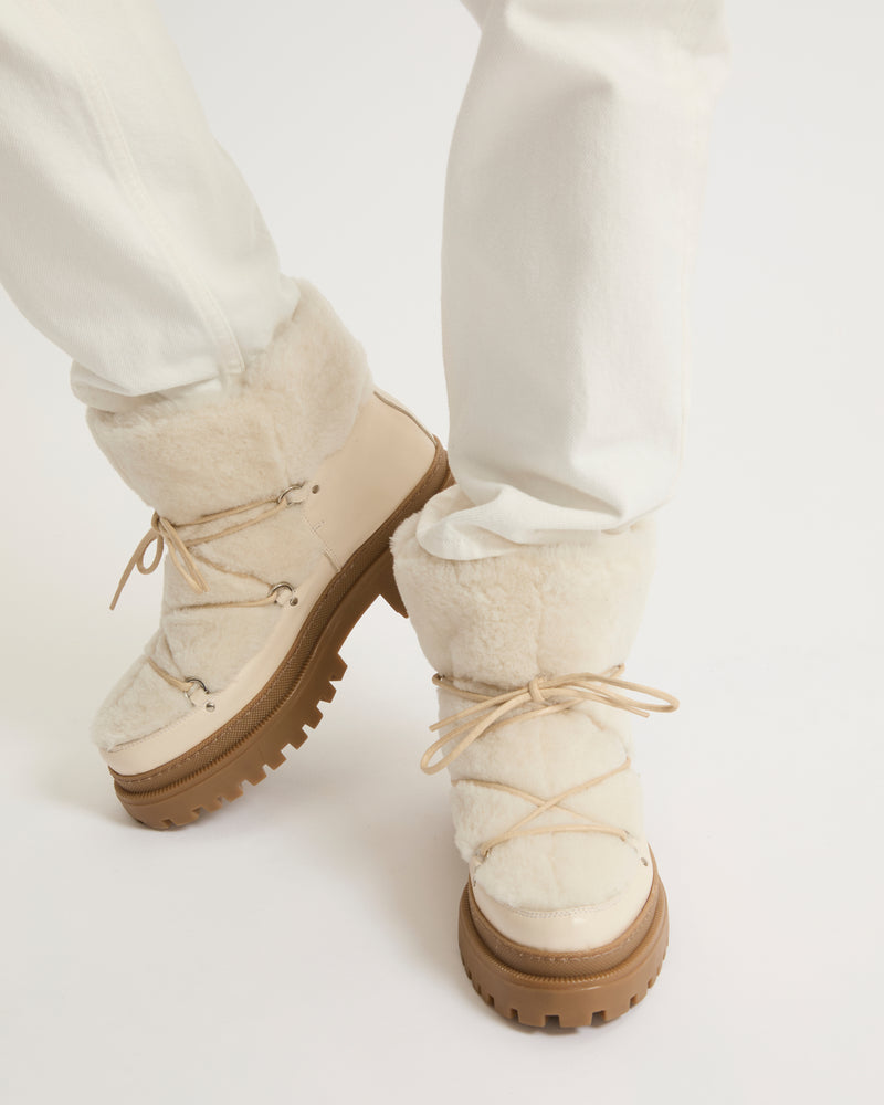 Lace-up mid-length shearling boots