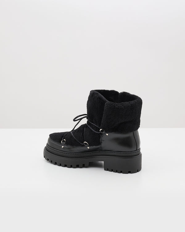 Lace-up mid-length shearling boots