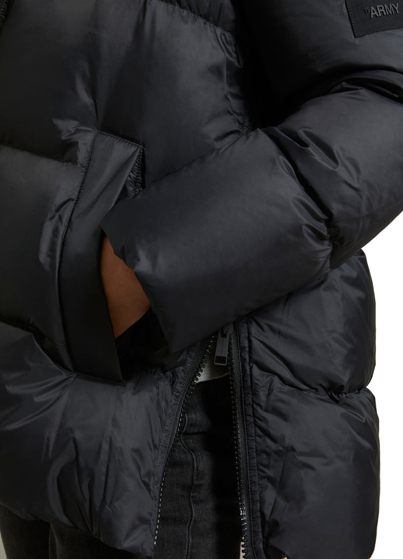 A line down jacket in water-repellent technical fabric with fox fur collar