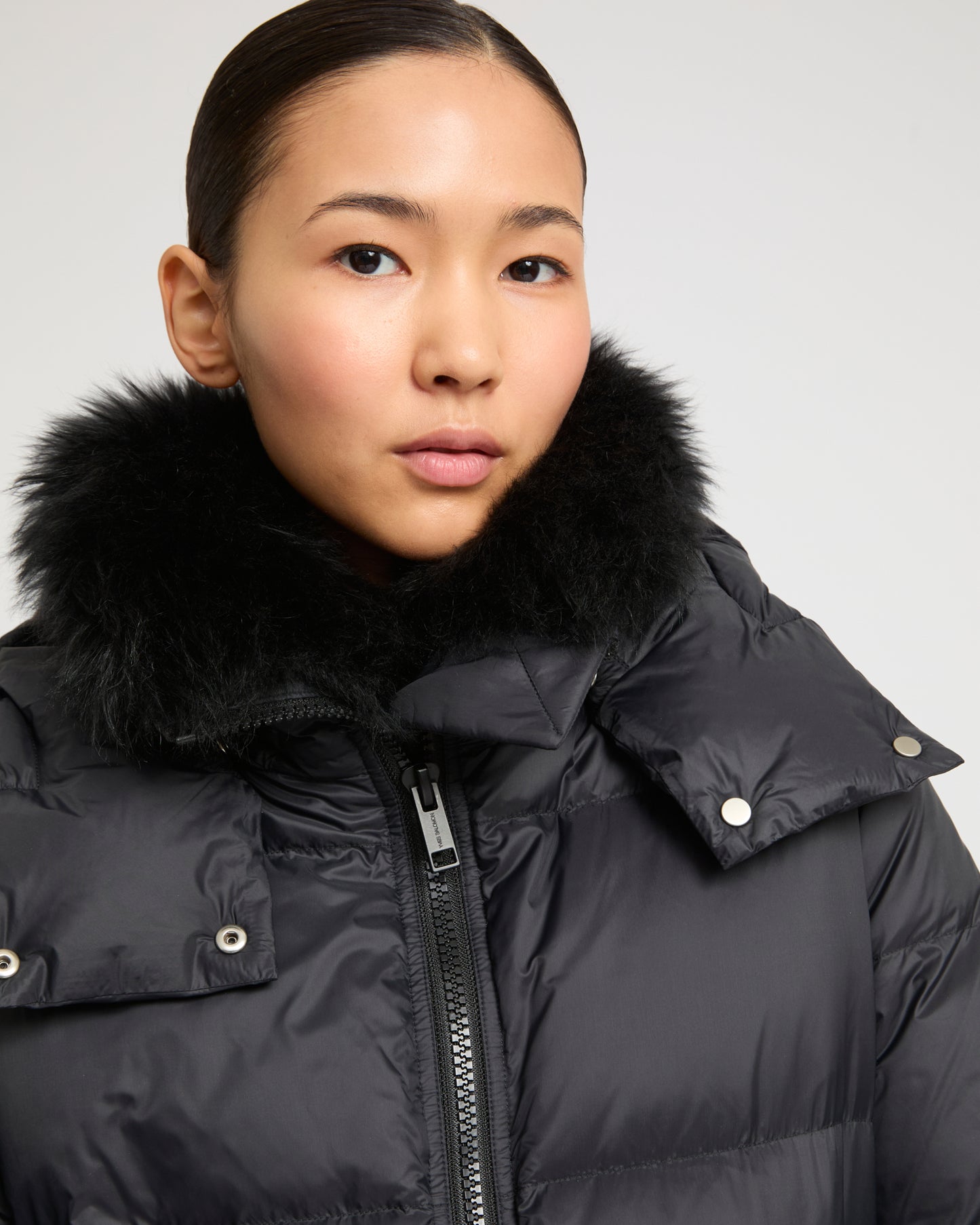 Iconic "A" line down jacket with lambswool collar