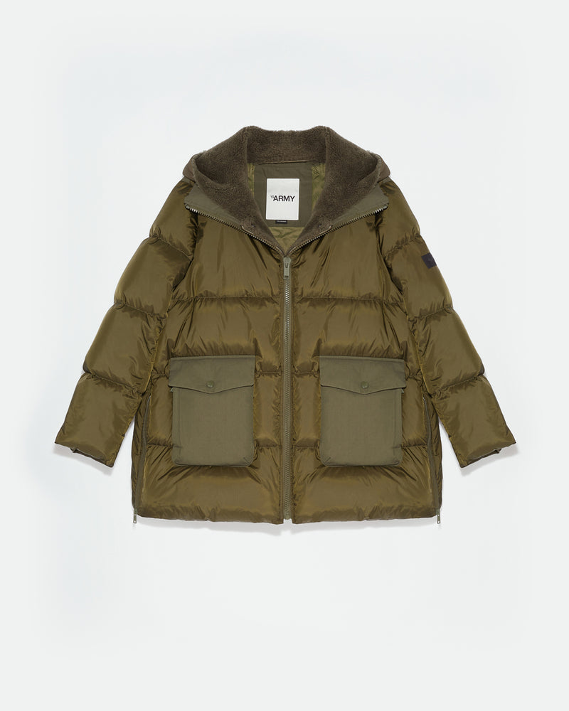 A line down jacket in a mix of technical fabrics with merino shearling  hooded bib