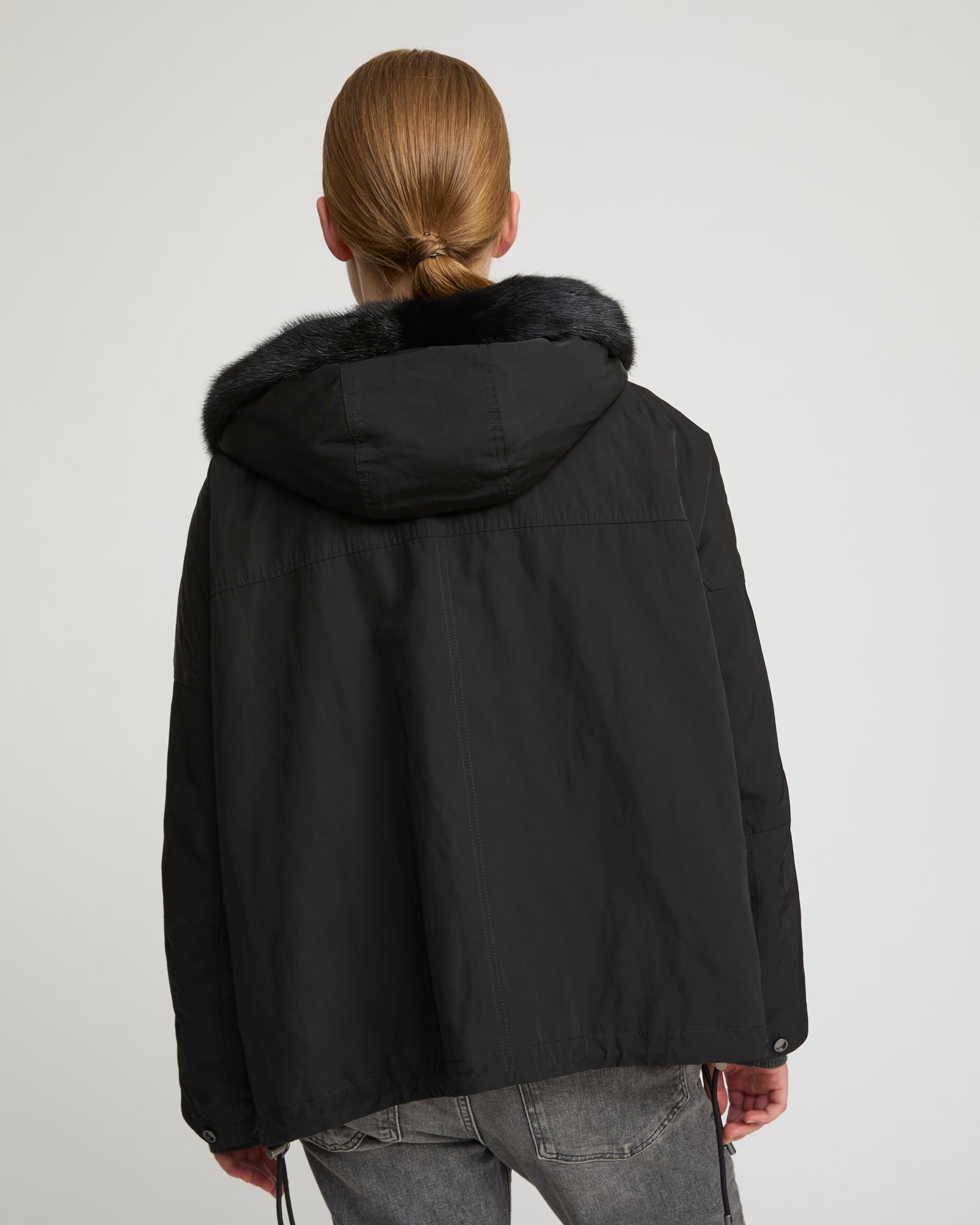 Short reversible parka in water-repellent technical fabric and