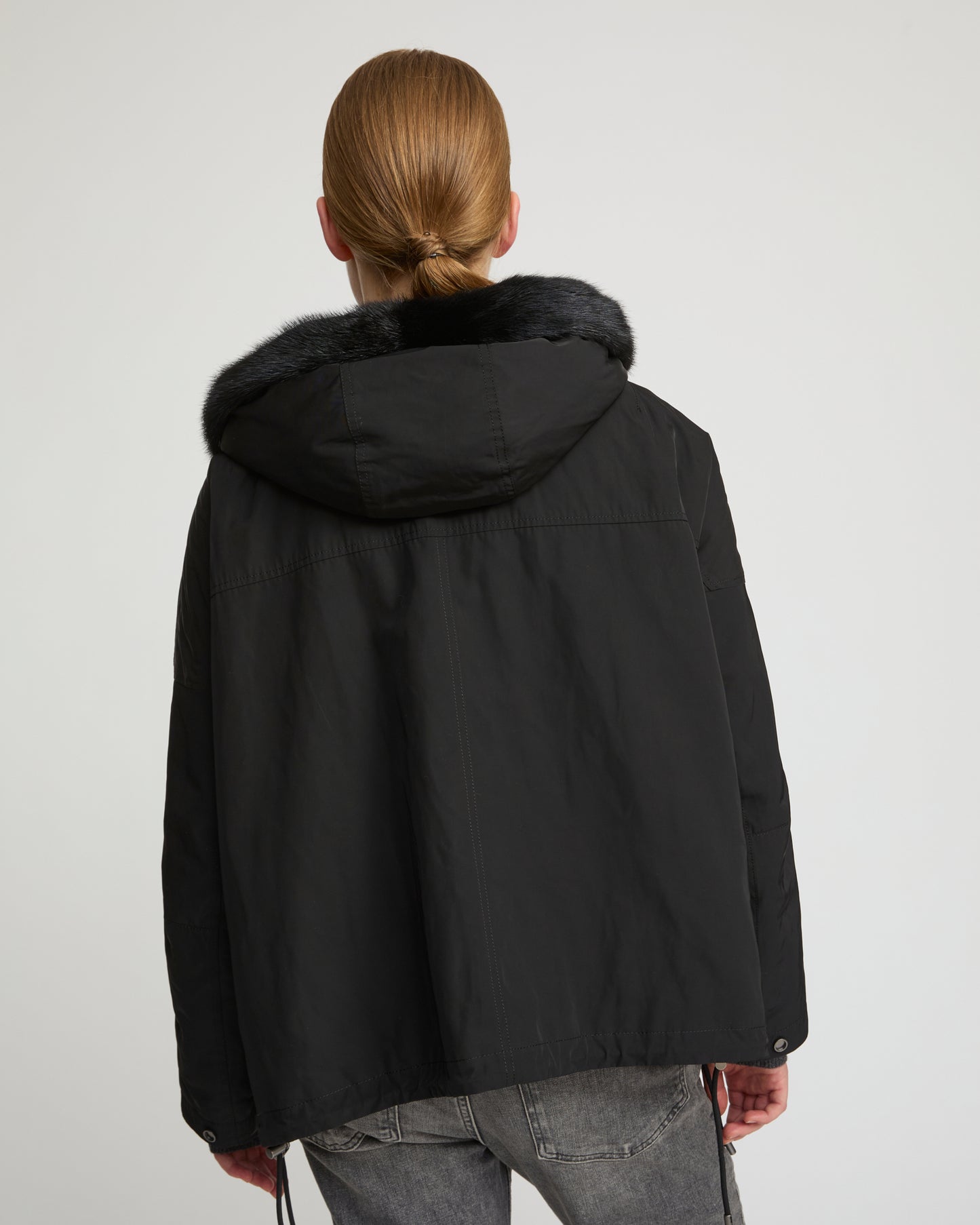 Short reversible parka in water-repellent technical fabric and long-haired mink