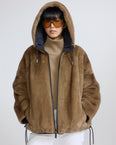 Short reversible water-repellent technical fabric jacket with mink fur