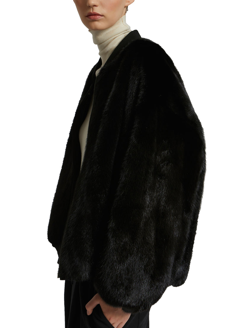 Reversible bomber jacket in water-repellent technical fabric and long-haired mink