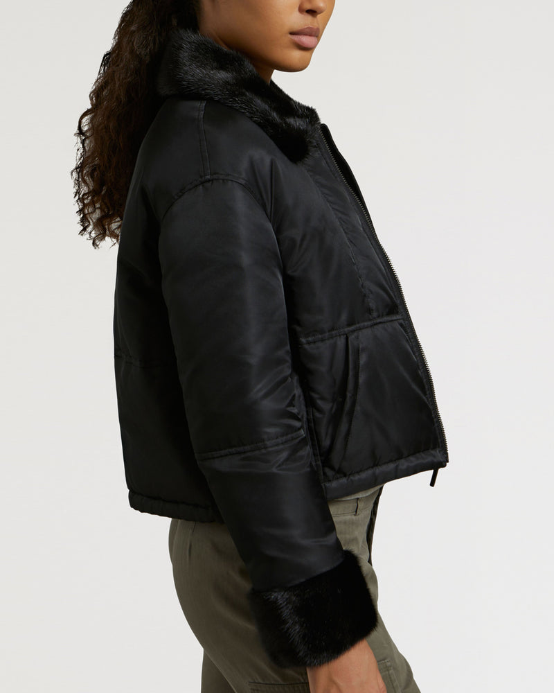 Jacket in water-repellent technical fabric with mink fur