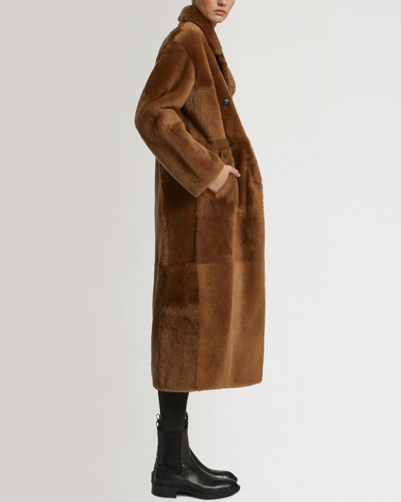 Long double-breasted shearling coat