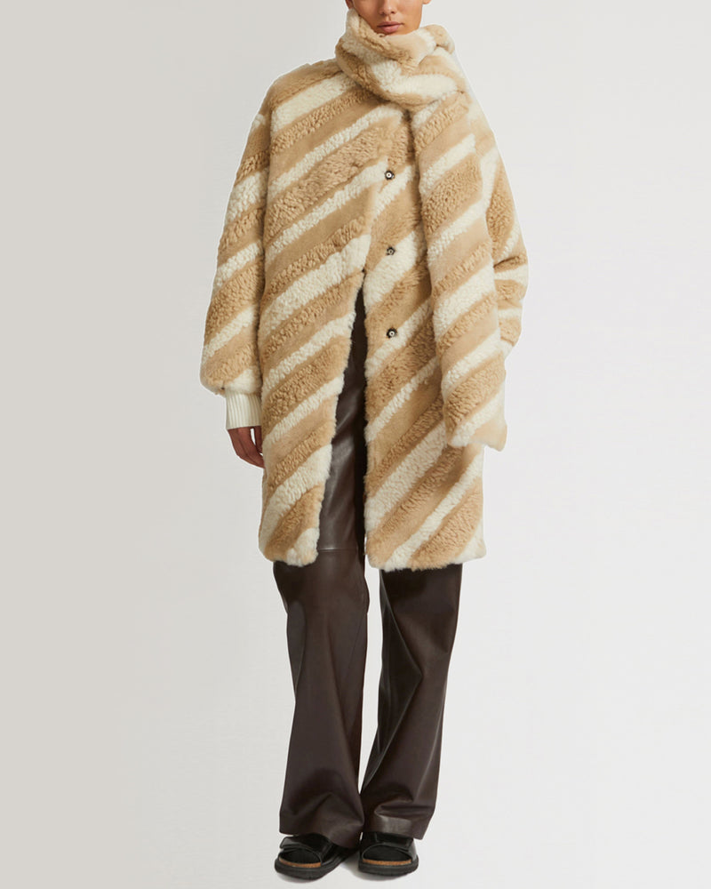 Long coat in curly merino wool and shearling