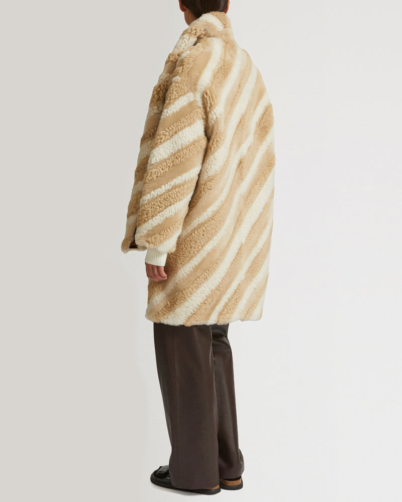 Long coat in curly merino wool and shearling