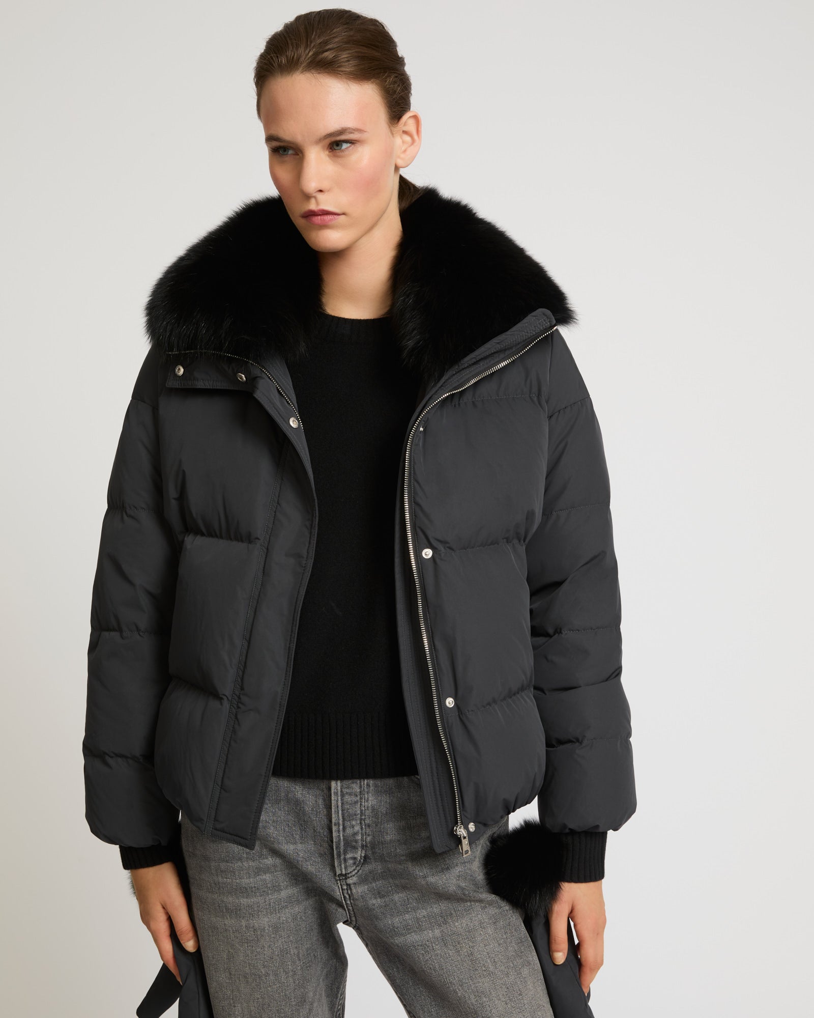 Boxy down jacket in waterproof technical fabric with fox fur collar