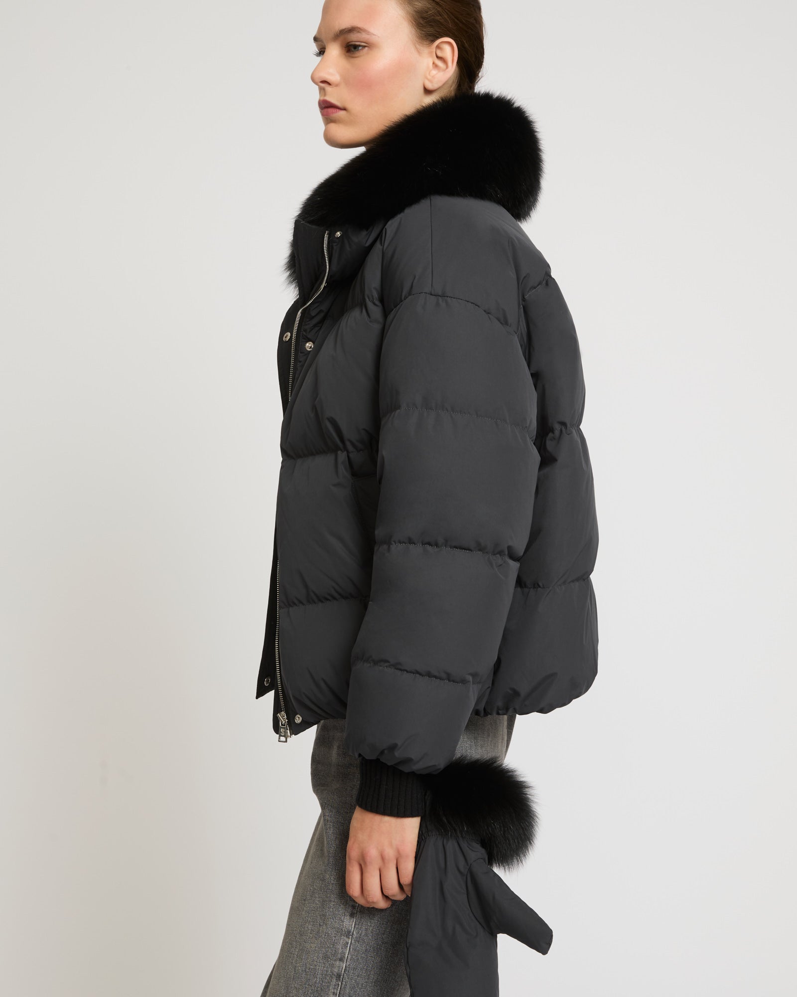 Boxy down jacket in waterproof technical fabric with fox fur