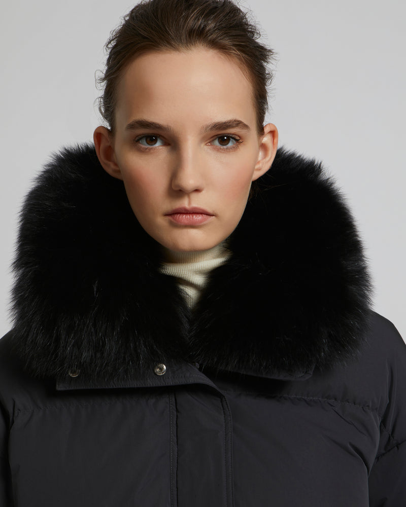 Boxy down jacket in waterproof technical fabric with fox fur collar