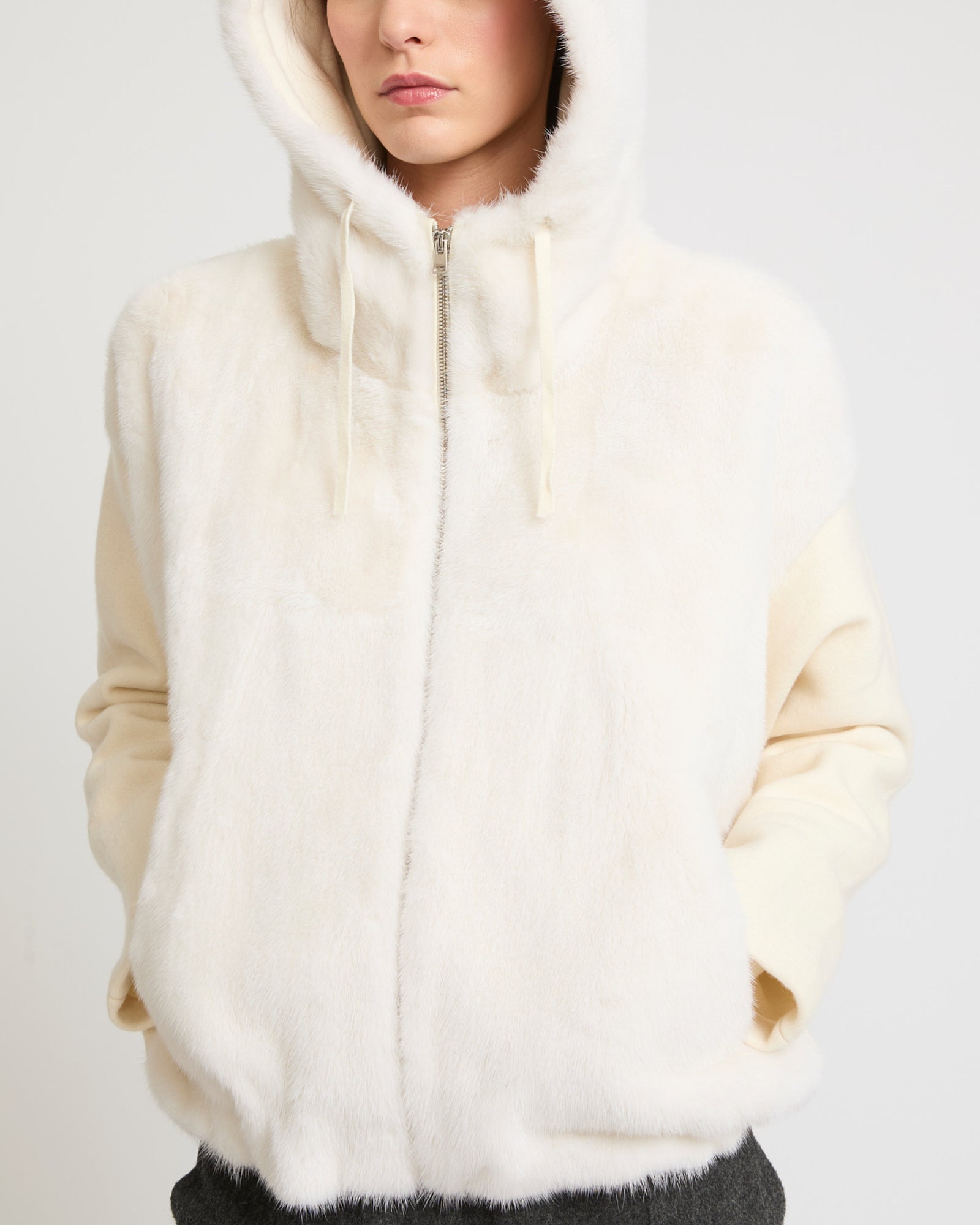 Belted down jacket in waterproof technical fabric with fox